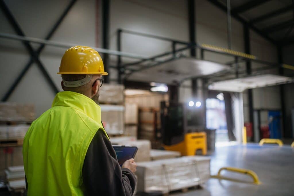 Transportation accounts payable team reviewing automated freight invoice matching and exception alerts in a document management workflow