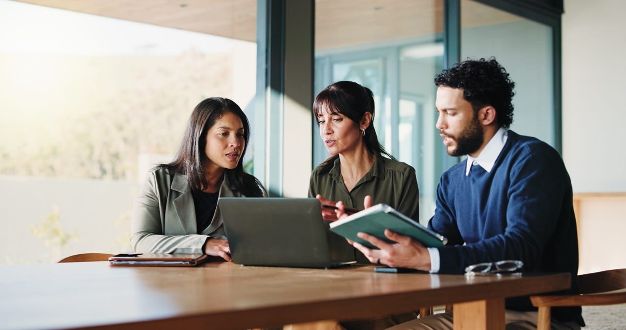 Operations manager reviewing version-controlled change management documentation and approval audit trail in Paperwise Symphony centralized document repository
