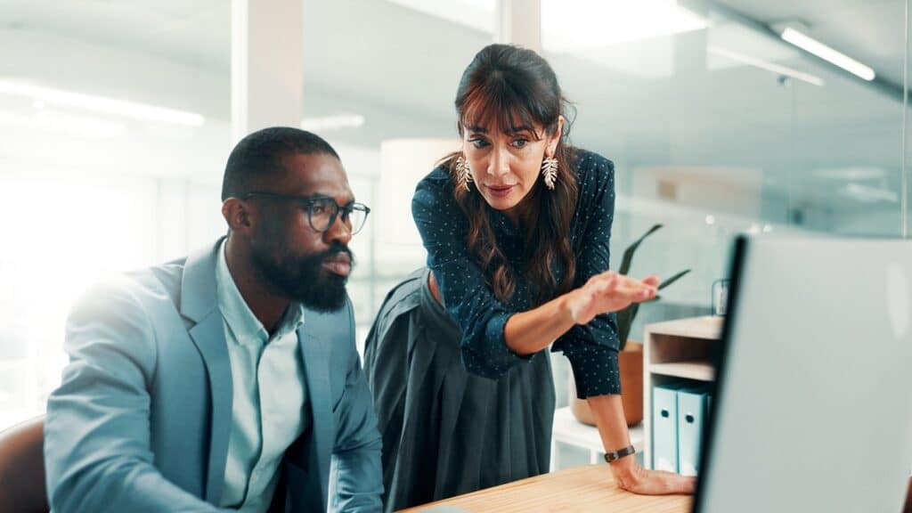 Finance team using Paperwise Symphony drag-and-drop workflow automation to route invoice approvals and eliminate manual document handling bottlenecks
