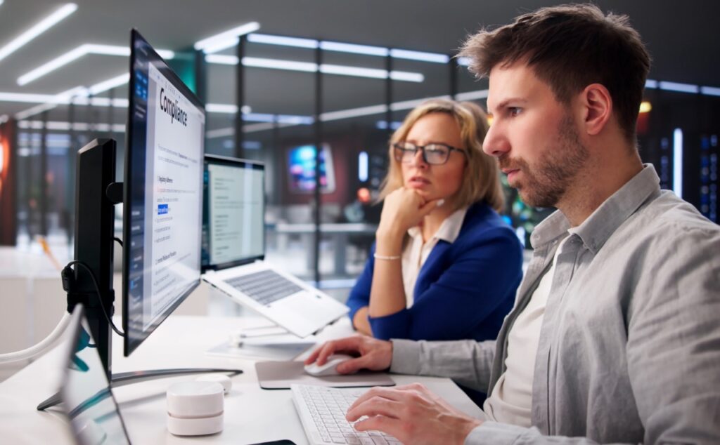 Compliance officer reviewing automated document retention schedules, legal hold management, and audit trail logs in Paperwise Symphony document management platform
