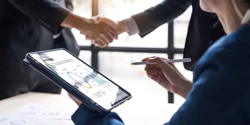 A signed contract being scanned with key terms and renewal dates extracted automatically