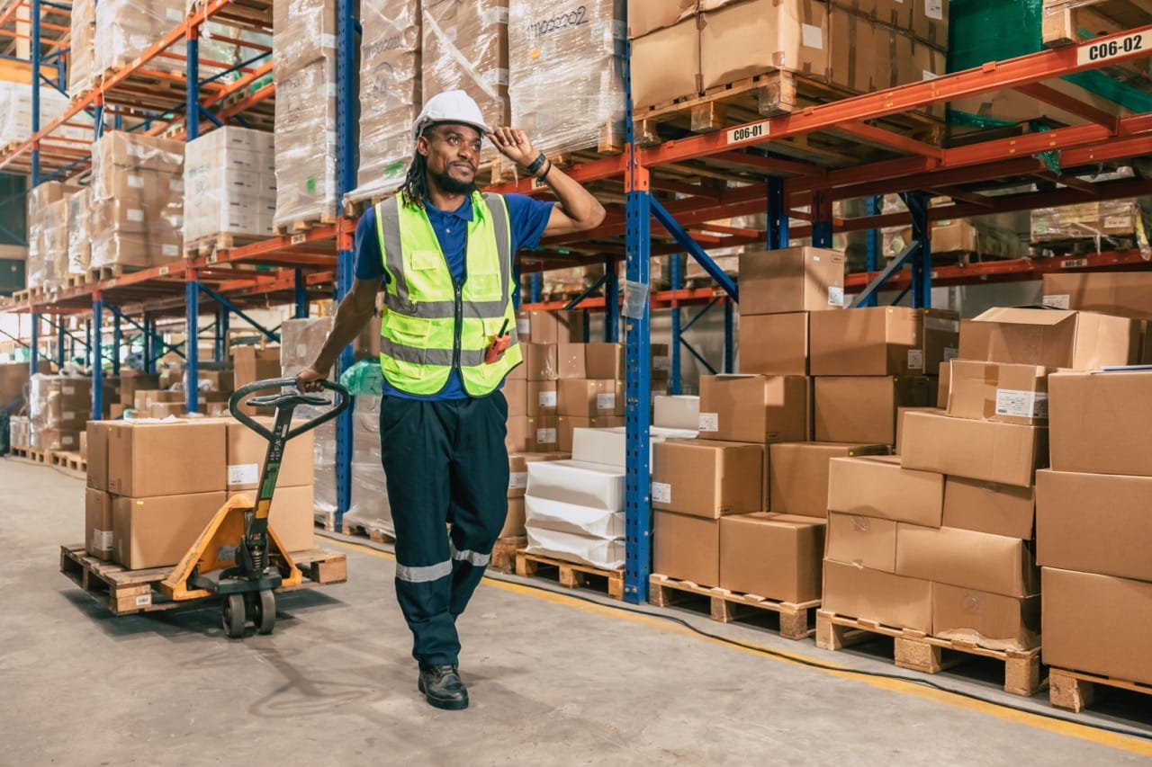 Warehouse worker capturing receiving documents with a mobile device at the dock