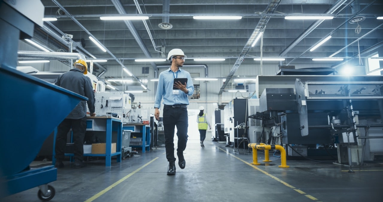 Contract manufacturing quality team reviewing customer-specific batch records in separate document spaces