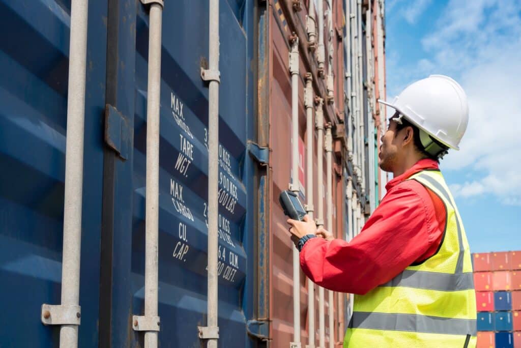 Fleet safety manager reviewing tanker inspection and hazmat compliance records