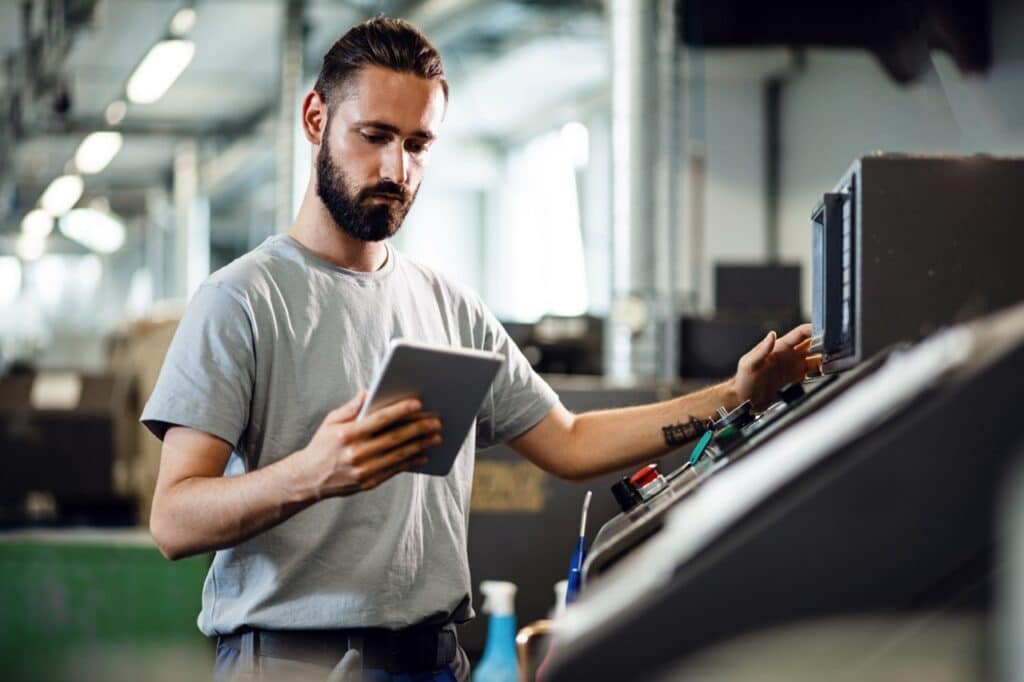 Quality engineer retrieving a controlled document instantly during a customer quality audit
