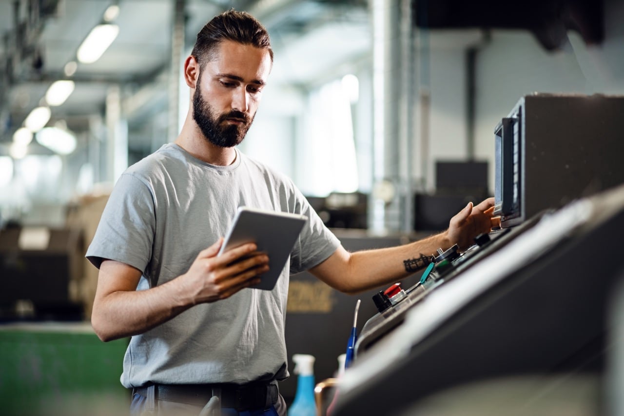 Quality engineer retrieving a controlled document instantly during a customer quality audit