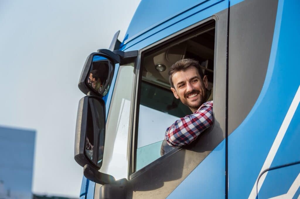 Fleet manager reviewing owner-operator qualification files in a document management system