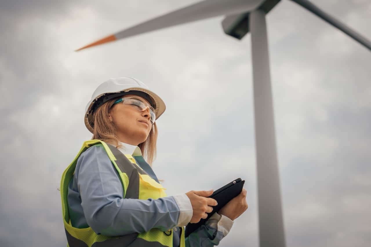 Field service technician submitting a utility work order digitally from a mobile device