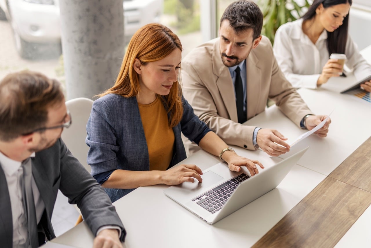 Corporate AP team using intelligent capture to process invoices across multiple entities